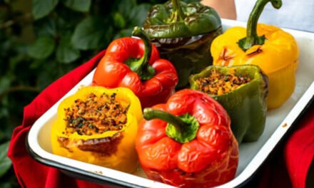 Quinoa-Stuffed Bell Peppers with Turmeric-Tahini Sauce