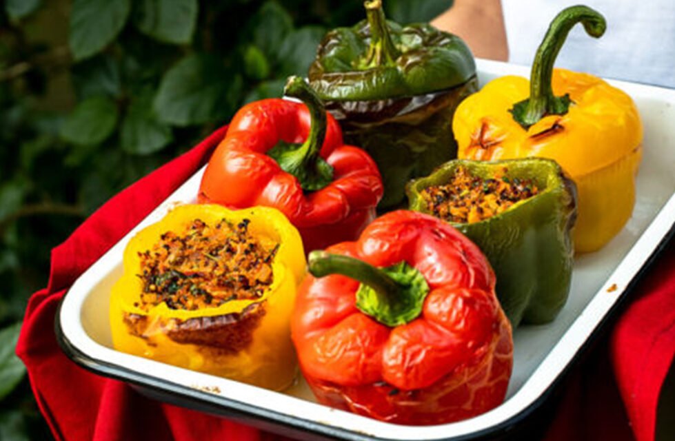 Quinoa-Stuffed Bell Peppers with Turmeric-Tahini Sauce