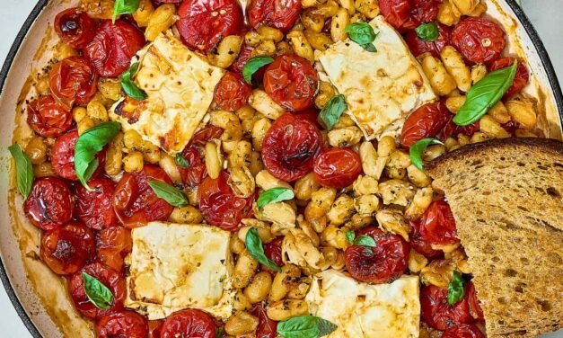White beans, tomatoes, and feta cooked in a skillet